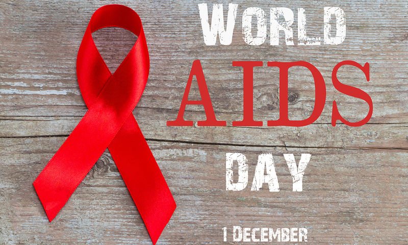 bigstock-Red-Ribbon--Aids-Awareness-Sy-269592154