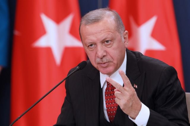 Turkish Erdogan attends a joint press conference with Serbia's President Aleksandar Vucic after their meeting in Belgrade