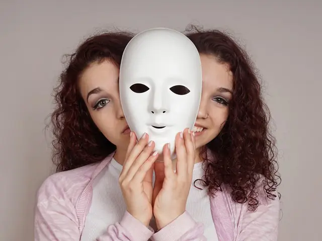 two-faced happy sad woman manic depression or schizophrenia concept