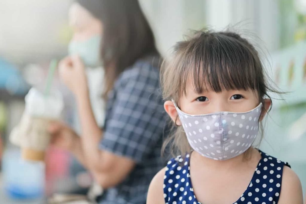 child-with-mask-min