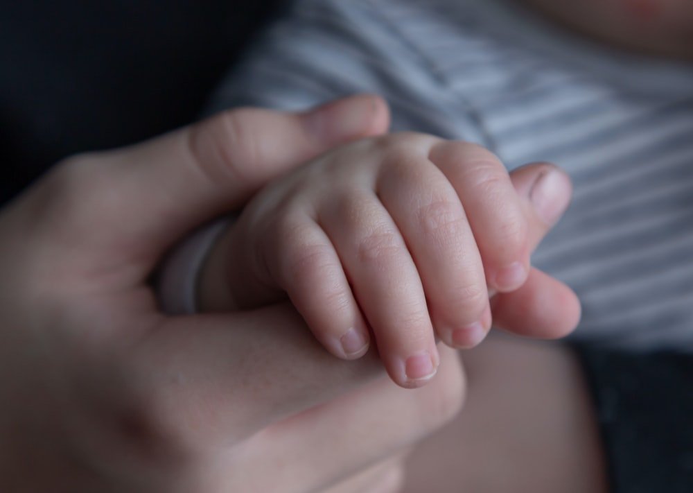 child hand parent