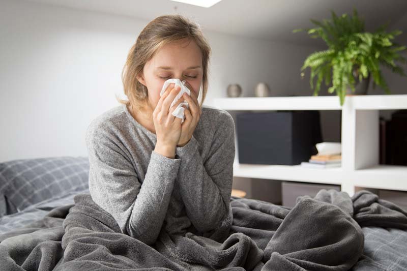 sick-woman- cold fever
