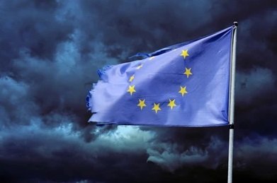 eu-torn-flag-stormy-sky-260nw-107487338