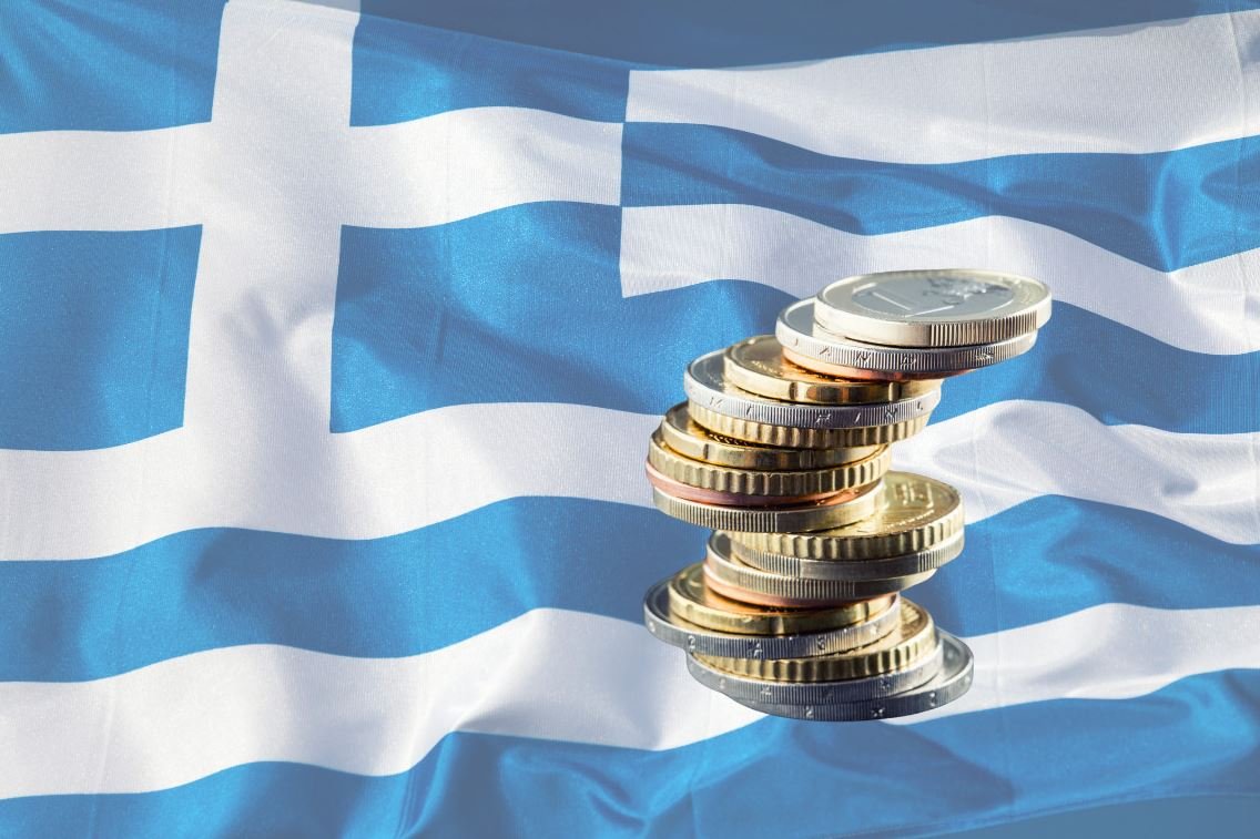 Ελληνικά Ομόλογα: Ανθεκτικότητα σε Διεθνείς Αναταράξεις χάρη σε Πρωτογενή Πλεονάσματα και Μείωση Χρέους
